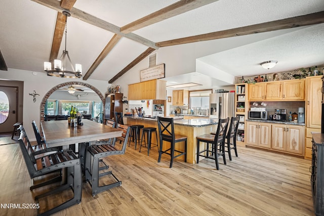 202 Summit Ave, Winnemucca, NV 89445 - dining space featuring a chandelier and light wood-type flooring