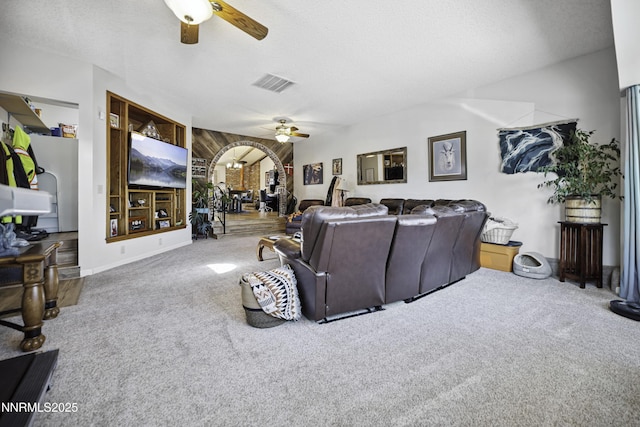 202 Summit Ave, Winnemucca, NV 89445 - living room featuring ceiling fan, carpet flooring, and a textured ceiling