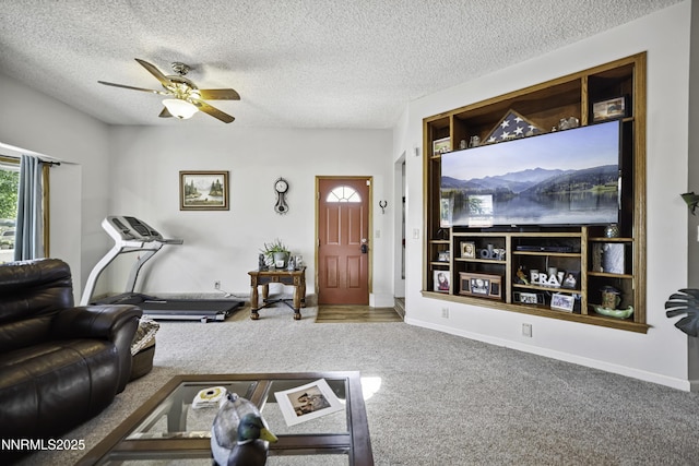 202 Summit Ave, Winnemucca, NV 89445 - living room featuring carpet floors, a ceiling fan, and a textured ceiling