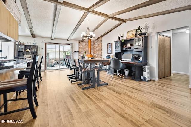202 Summit Ave, Winnemucca, NV 89445 - dining area with a chandelier, light wood finished floors, and a desk