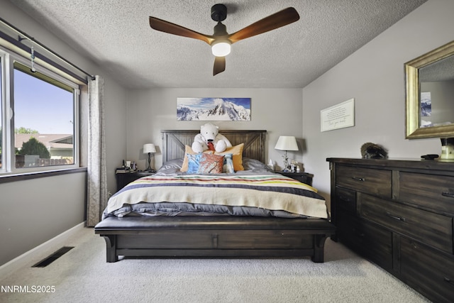 202 Summit Ave, Winnemucca, NV 89445 - bedroom featuring carpet flooring, a textured ceiling, and ceiling fan