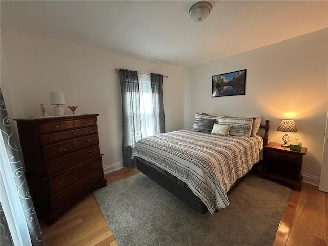 563 W 9th St, Erie, PA 16502 - bedroom featuring light wood-style floors and baseboards