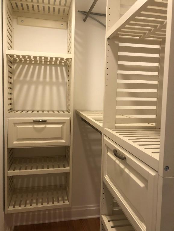 563 W 9th St, Erie, PA 16502 - walk in closet featuring wood finished floors