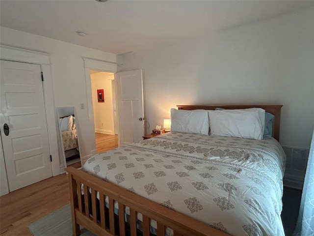 563 W 9th St, Erie, PA 16502 - bedroom with wood finished floors