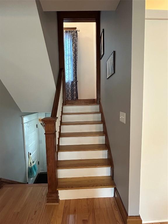 563 W 9th St, Erie, PA 16502 - stairs featuring wood finished floors