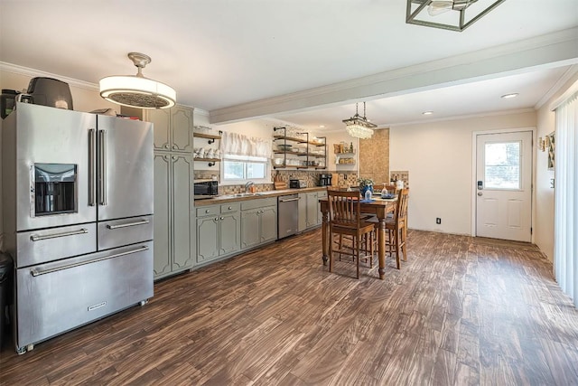 9 E Division St, North East, PA 16428 - dining room featuring plenty of natural light, dark wood-style floors, ornamental molding, and recessed lighting