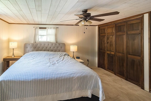 9 E Division St, North East, PA 16428 - bedroom featuring light carpet, a ceiling fan, crown molding, and a closet