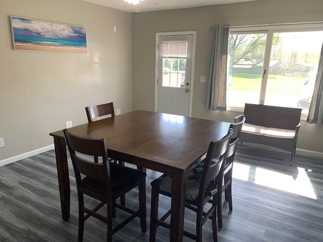 6028 Davidson Rd, Jamestown, PA 16134 - dining space featuring dark wood-type flooring and baseboards