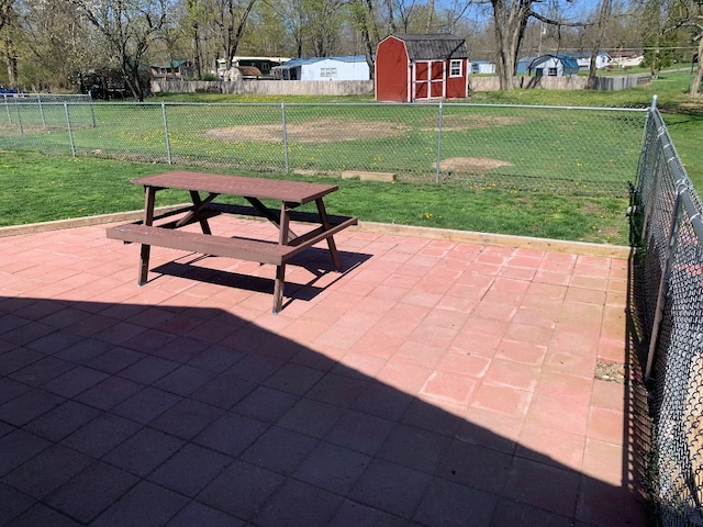 6028 Davidson Rd, Jamestown, PA 16134 - view of patio / terrace with a shed and an outdoor structure