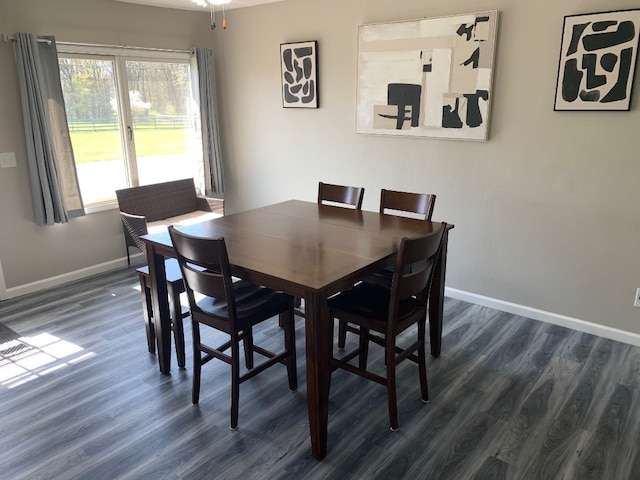 6028 Davidson Rd, Jamestown, PA 16134 - dining area with baseboards and dark wood-style floors