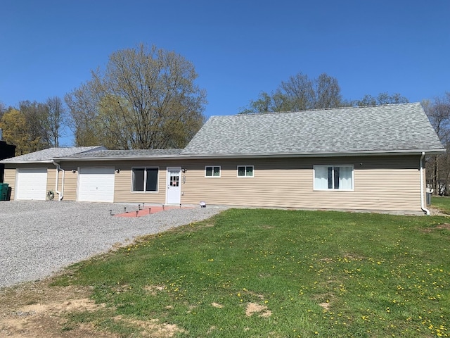 6028 Davidson Rd, Jamestown, PA 16134 - single story home with a front yard, a garage, and a shingled roof