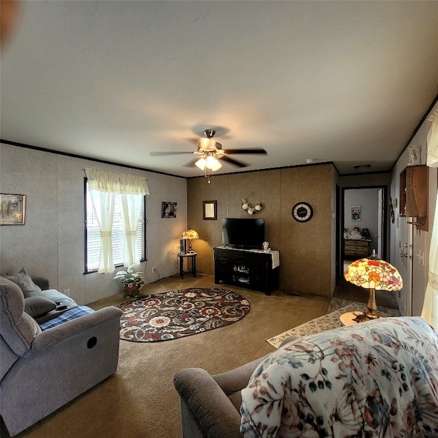 carpeted living room featuring ceiling fan