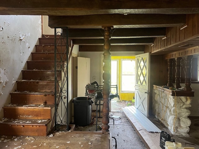 interior space featuring beamed ceiling