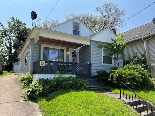 113 E 29th St, Erie, PA 16504 - view of front of home with a porch and a detached garage