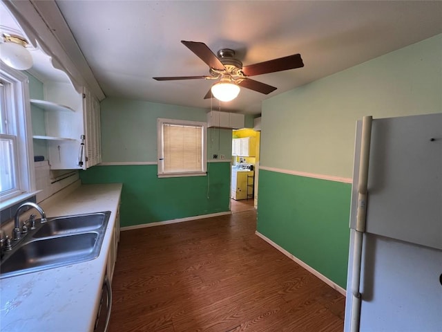 113 E 29th St, Erie, PA 16504 - kitchen featuring freestanding refrigerator, a sink, a ceiling fan, dark wood-style floors, and open shelves