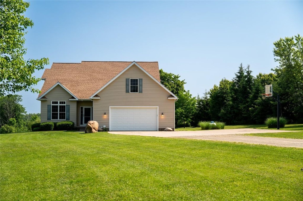 3250 Old Meadville Rd, Waterford, PA 16441 - traditional-style house featuring driveway, an attached garage, and a front yard