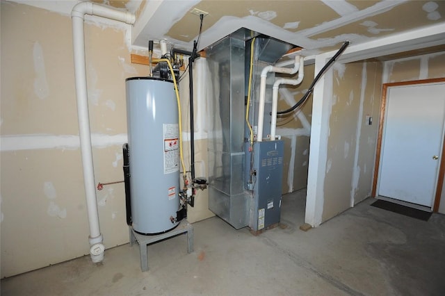 utility room featuring heating unit and water heater