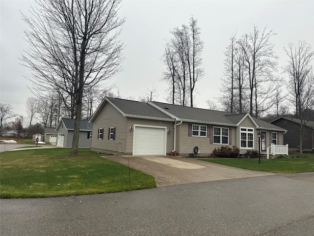 ranch-style house featuring a front yard and a garage