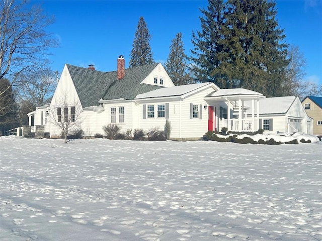 view of front of house featuring a garage and covered porch