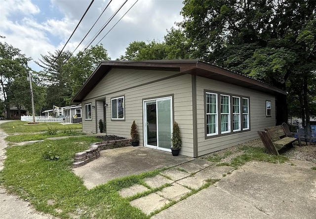 12013 Teifer Ave, Conneaut Lake, PA 16316 - view of side of property featuring a patio