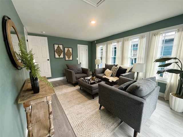 12013 Teifer Ave, Conneaut Lake, PA 16316 - living room with light wood finished floors, baseboards, and recessed lighting