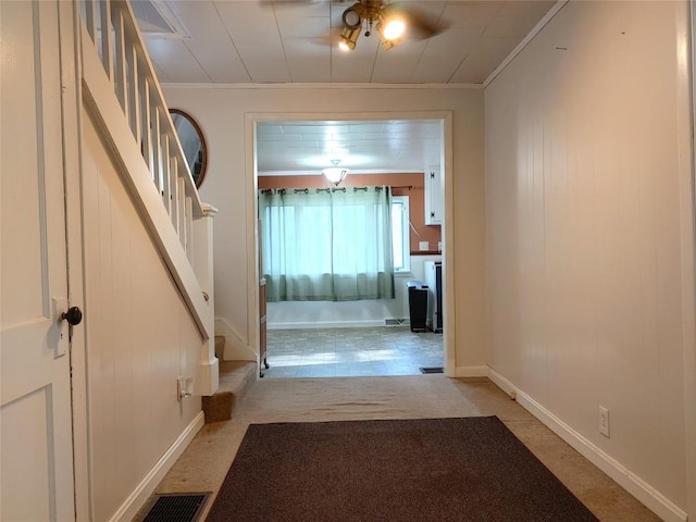19437 Green Mountain St, Meadville, PA 16335 - hallway featuring ornamental molding, stairway, carpet, and baseboards