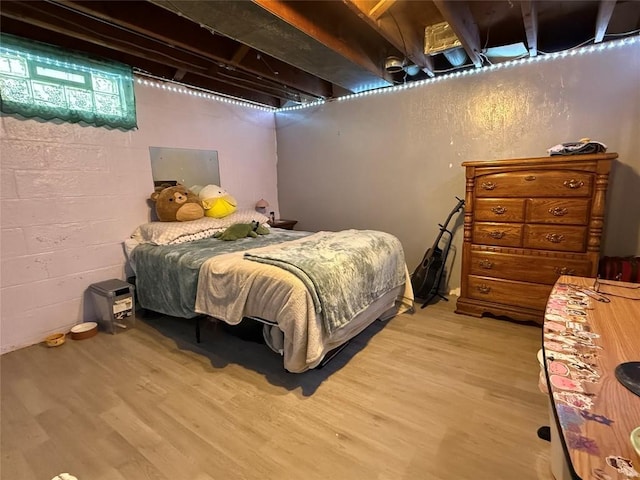 bedroom featuring hardwood / wood-style floors