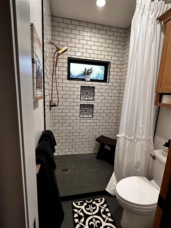 12075 Oakmont Dr, Conneaut Lake, PA 16316 - full bathroom featuring a stall shower and tile patterned flooring