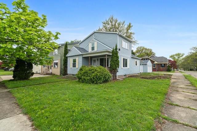 view of front of home featuring a front lawn