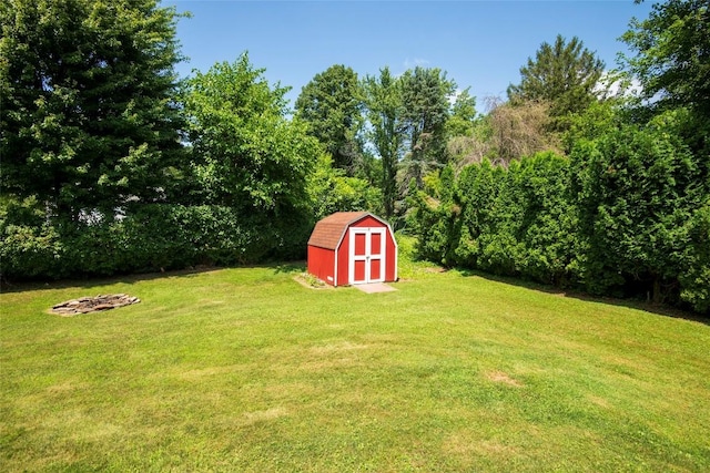 969 Lewis Way, Girard, PA 16417 - view of grassy yard featuring a storage shed and an outdoor fire pit