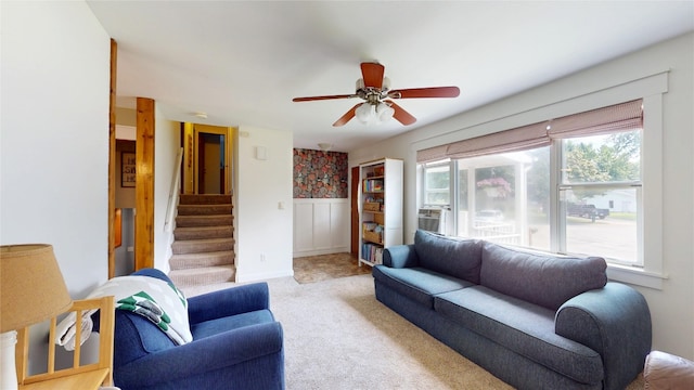 969 Lewis Way, Girard, PA 16417 - carpeted living room featuring ceiling fan, stairway, wainscoting, and cooling unit