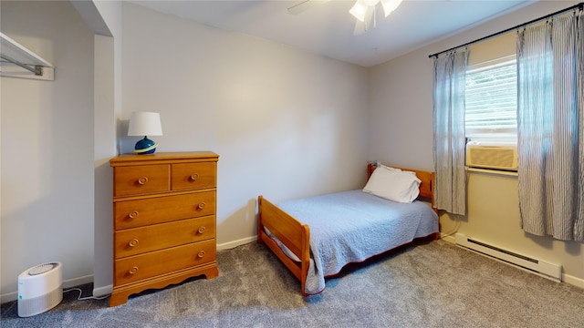 969 Lewis Way, Girard, PA 16417 - bedroom featuring a baseboard radiator, a ceiling fan, and carpet