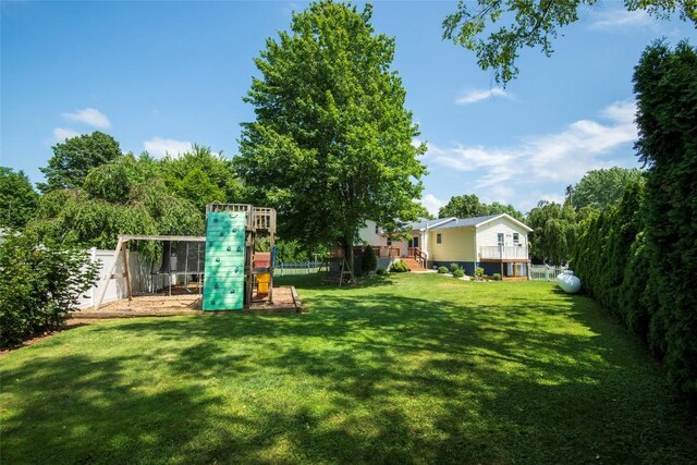 969 Lewis Way, Girard, PA 16417 - view of grassy yard featuring a storage shed and an outdoor fire pit