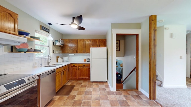 969 Lewis Way, Girard, PA 16417 - kitchen featuring stainless steel appliances, open shelves, ventilation hood, brown cabinetry, and decorative backsplash