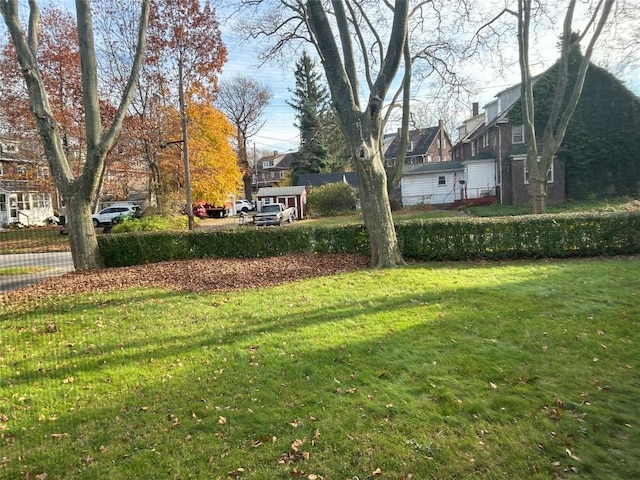 view of yard featuring a residential view