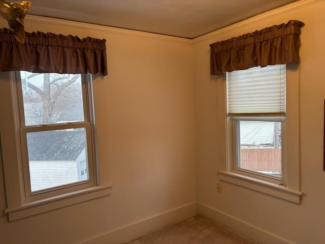 empty room with baseboards