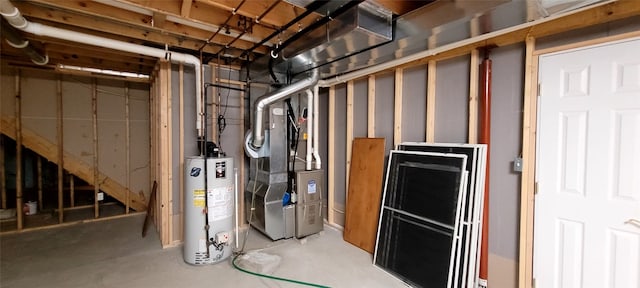 basement with gas water heater and heating unit