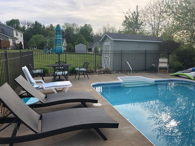view of swimming pool with a patio