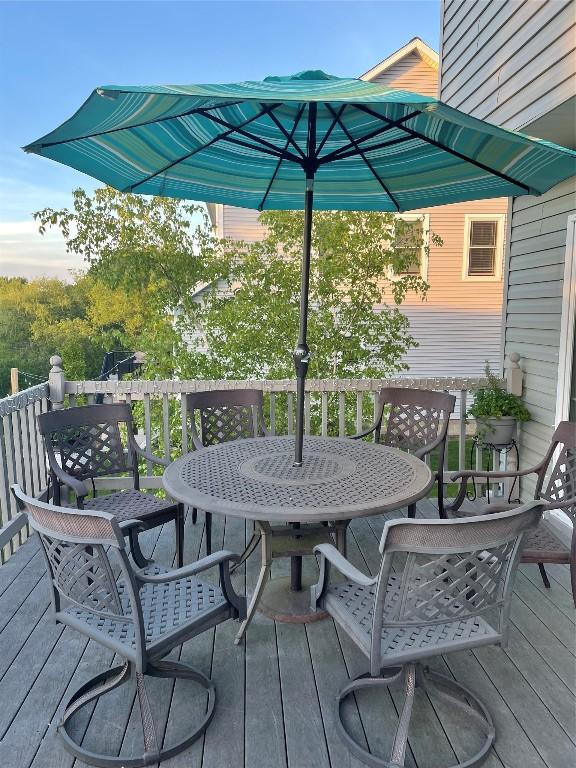 deck featuring outdoor dining area