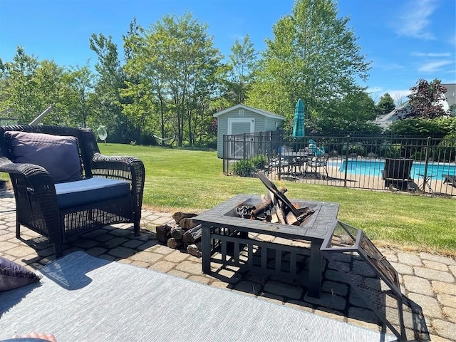 view of patio with a fire pit