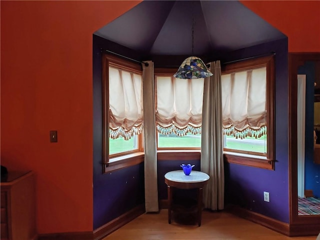 unfurnished dining area featuring hardwood / wood-style floors