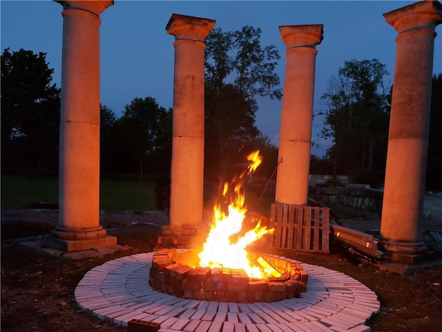 view of patio with an outdoor fire pit