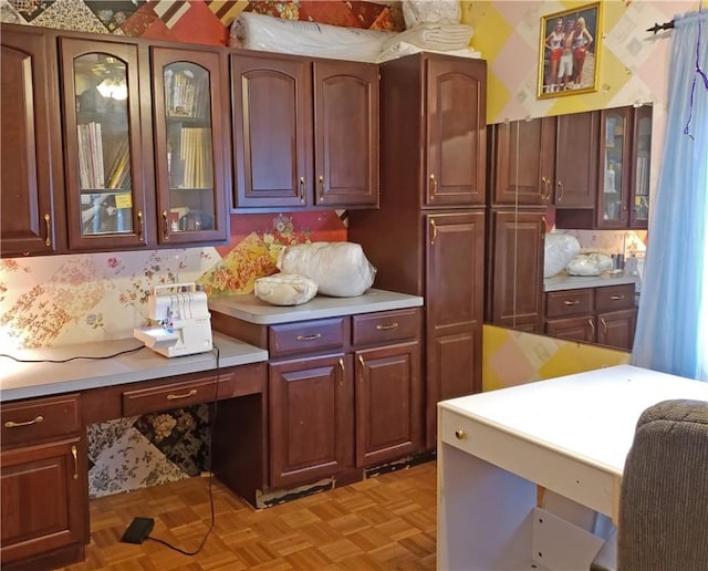 kitchen featuring light parquet flooring