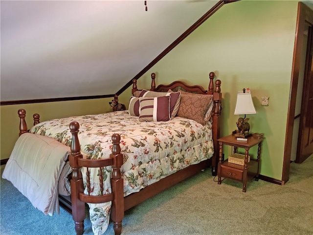 bedroom featuring carpet floors and vaulted ceiling