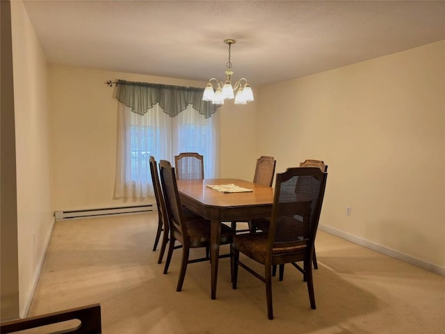 carpeted dining area featuring a baseboard heating unit and an inviting chandelier