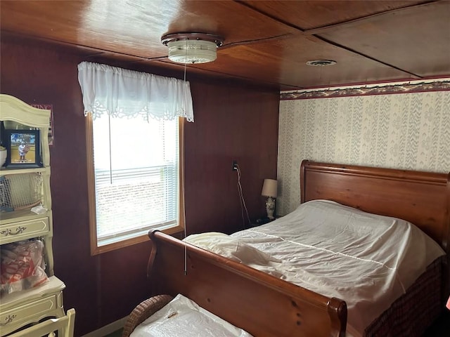 bedroom featuring multiple windows