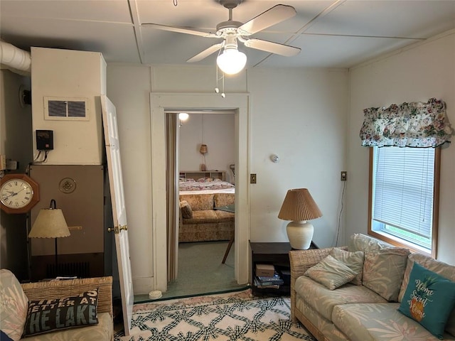 12656 Comstock St, Conneaut Lake, PA 16316 - living area with a ceiling fan and light carpet