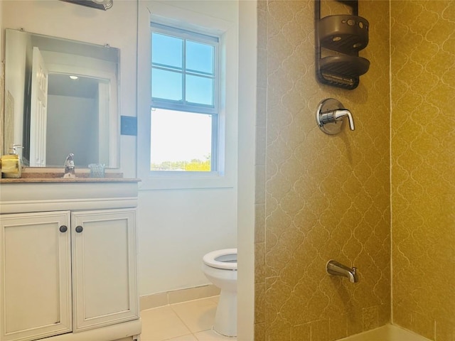 bathroom featuring tile patterned floors, vanity, walk in shower, and toilet