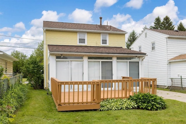 3411 Elmwood St, Erie, PA 16508 - rear view of house with a sunroom, a wooden deck, and roof with shingles