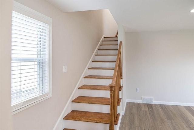 3411 Elmwood St, Erie, PA 16508 - stairs with wood finished floors, baseboards, and recessed lighting